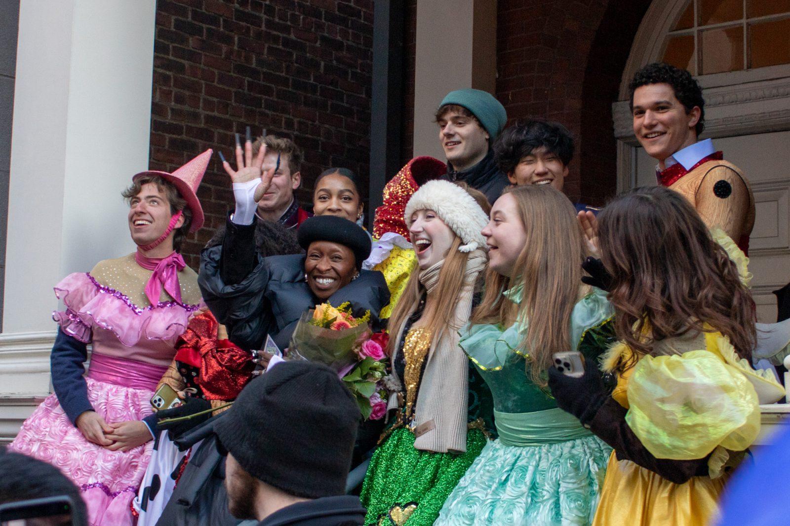 Cynthia Erivo waves to the crowd at the end of the Hasty Pudding Woman of the Year Parade. HOLLY GUSTAVSEN/DFP PHOTOGRAPHER 
