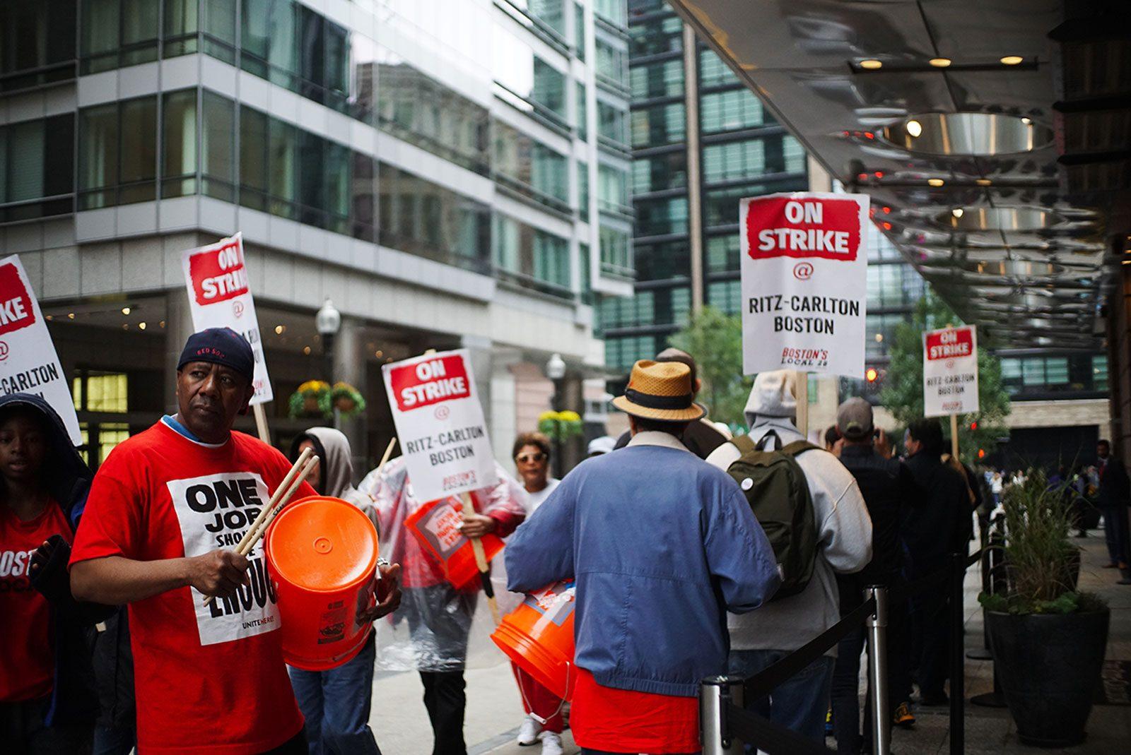 Hotel workers protest outside the Ritz Carlton in Boston Oct. 8. The Boston City Council voted unanimously Wednesday to support the “One Job Should be Enough” movement led by hotel workers. SOPHIE PARK/ DAILY FREE PRESS STAFF