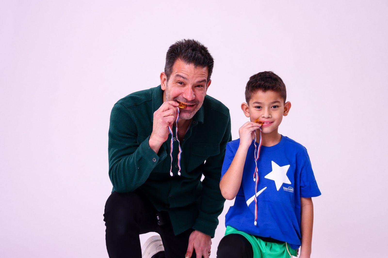 George Mendes, executive chef of Amar restaurant in Back Bay, and a child with Make-A-Wish. Mendes hosted a fundraiser dinner for Make-A-Wish Massachusetts and Rhode Island Feb. 25 in the Raffles Boston hotel in Back Bay. COURTESY OF DALIA SADAKA 