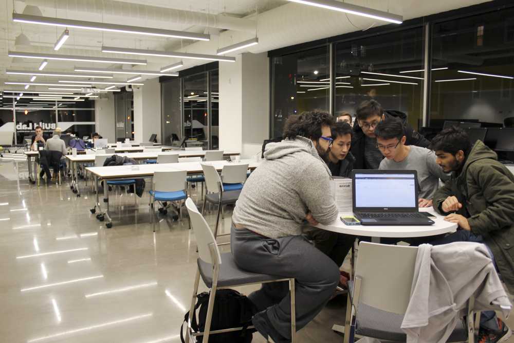 Students do work in the BUild Lab. The Lab hosted an event for young entrepreneurs without U.S. citizenship on Wednesday. PHOTO BY JENNA MANTO/DAILY FREE PRESS STAFF 

