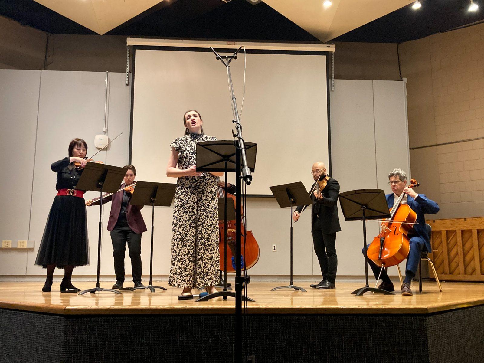 Hannah Shanefield performs with the Vivaldi Orchestra for White Snake Projects’ Sing Out Strong concert March 14. The Sing Out Strong concert series features local community members performing pieces about activist topics. COURTESY OF WHITE SNAKE PROJECTS