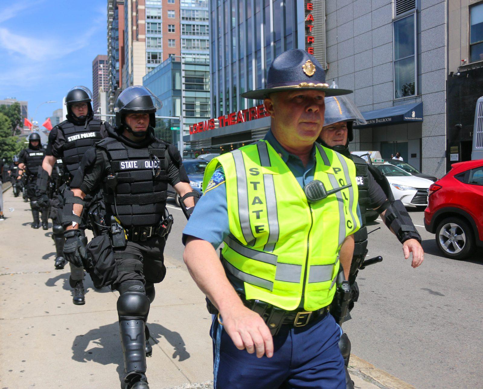 A Massachusetts State Police Officer at a 2017 rally in the Boston Common. The Massachusetts State Police is introducing a body camera pilot program, state police superintendent Kerry Gilpin said in a Monday press release. GABRIELA HUTCHINGS/ DAILY FREE PRESS STAFF