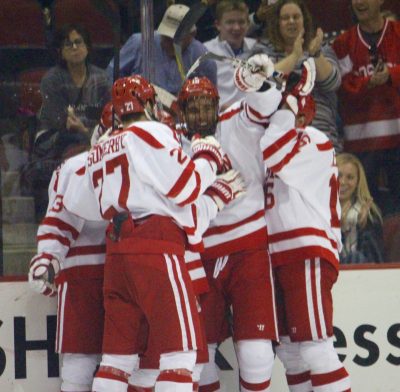 Greenway and co. celebrates BU's goal in the first period. PHOTO BY JONATHAN SIGAL /DAILY FREE PRESS