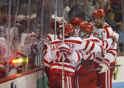 The Terriers celebrate Bobo Carpenter's goal in the second period. PHOTO BY JONATHAN SIGAL/DAILY FREE PRESS