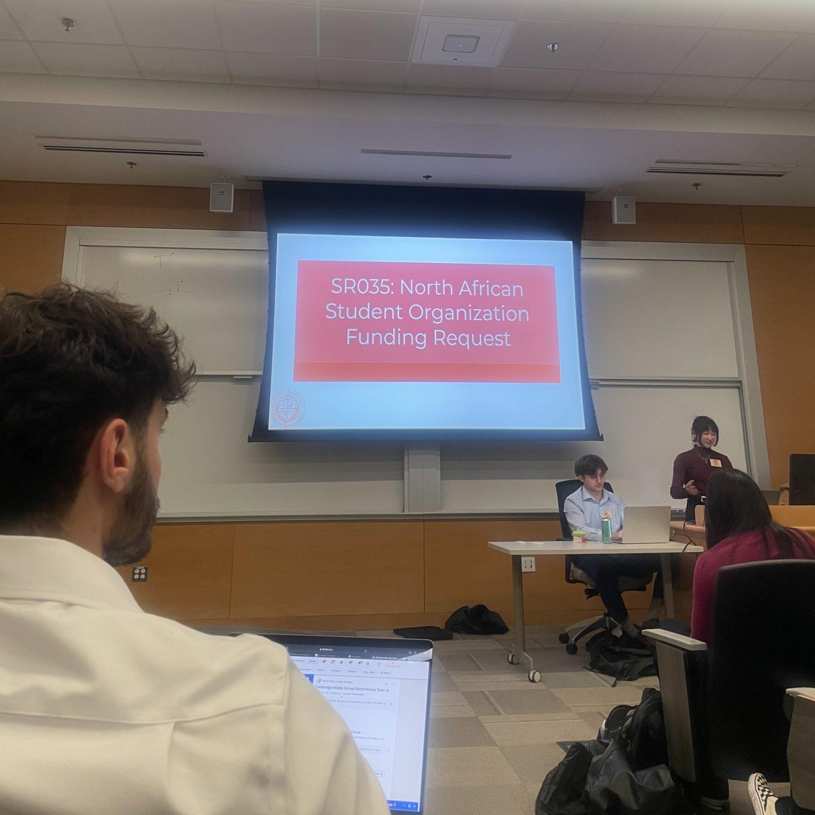 The North African Student Organization presents their funding request at the Boston University Student Government meeting March 24. StuGov members received an update about the Warren Towers renovation and approved funds for three student organizations. PHOTO BY ELIZABETH MEHLER
