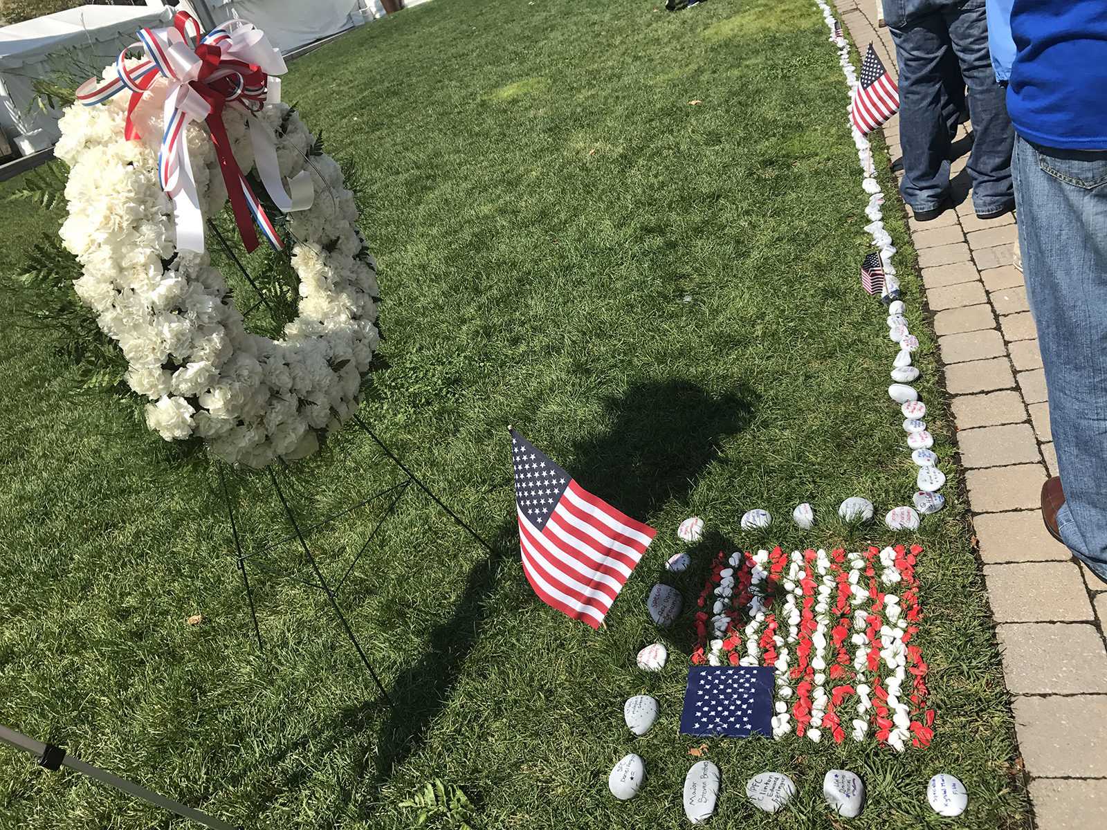The Massachusetts Military Heroes Fund hosts a volunteer service effort Monday afternoon at Rose Fitzgerald Kennedy Greenway in remembrance of 9/11. PHOTO BY MADDIE DOMENICHELLA/ DAILY FREE PRESS STAFF