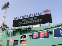 A billboard welcoming students to CollegeFest at Fenway Park