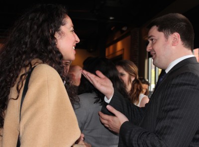 City Councilor Josh Zakim speaks to Rickie Golden, 31, of Cambridge at the campaign kickoff event hosted at The Mission Bar and Grill Tuesday night. PHOTO BY FELICIA GANS/ DAILY FREE PRESS STAFF