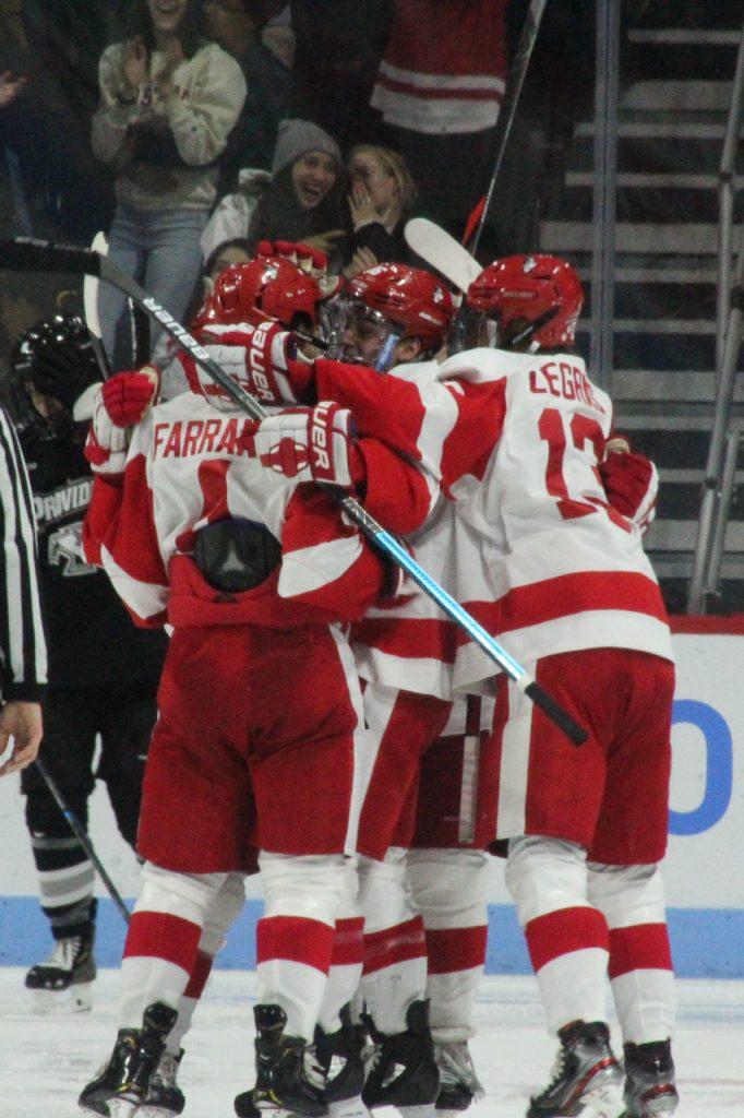 BU celebrates one of David Farrance’s goals from Friday night against Providence. JENNA VANSICKLE/ DAILY FREE PRESS STAFF
