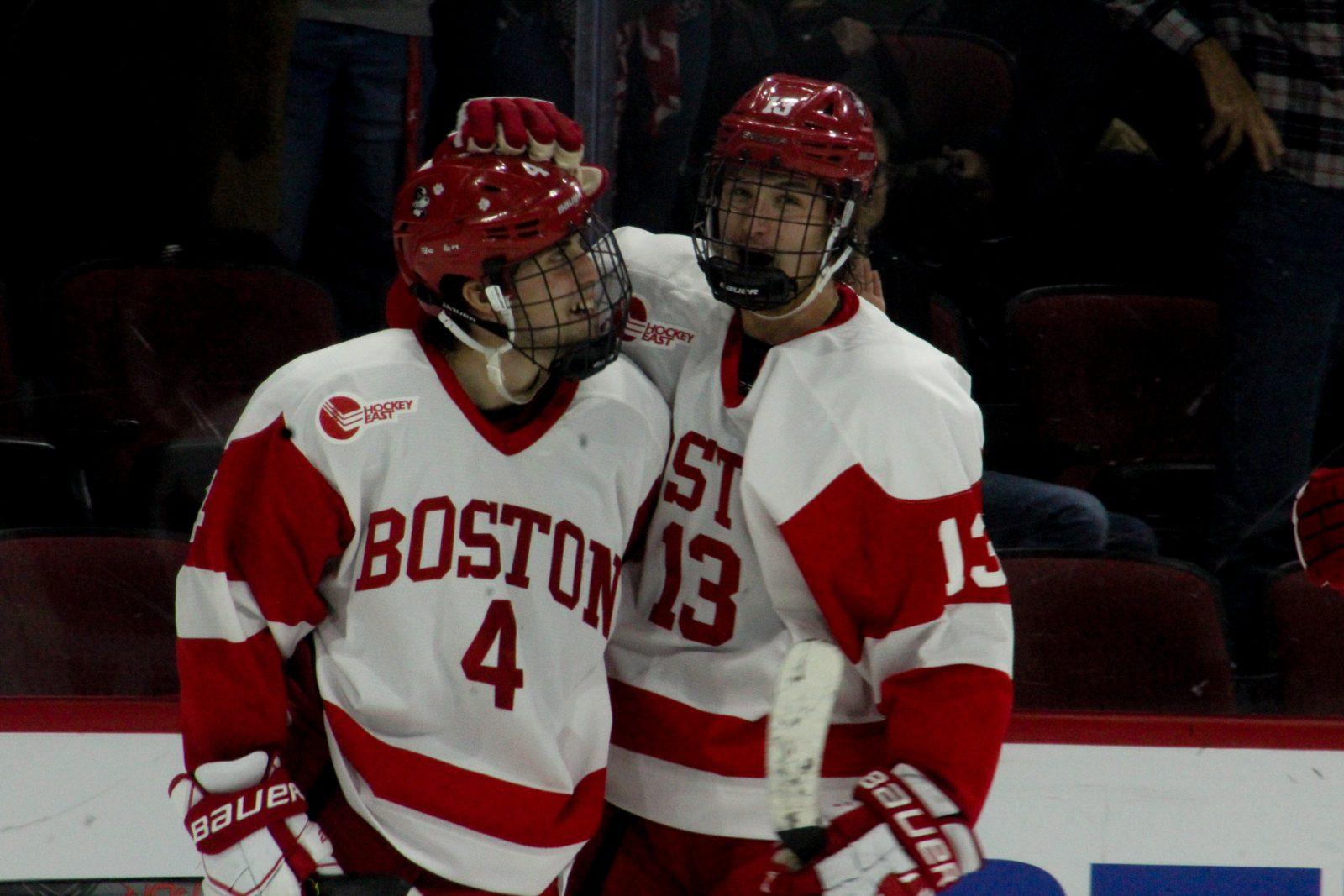 David Farrance celebrates the second of his two goals with Trevor Zegras, who had a three-point night. JENNA VANSICKLE/ DAILY FREE PRESS STAFF