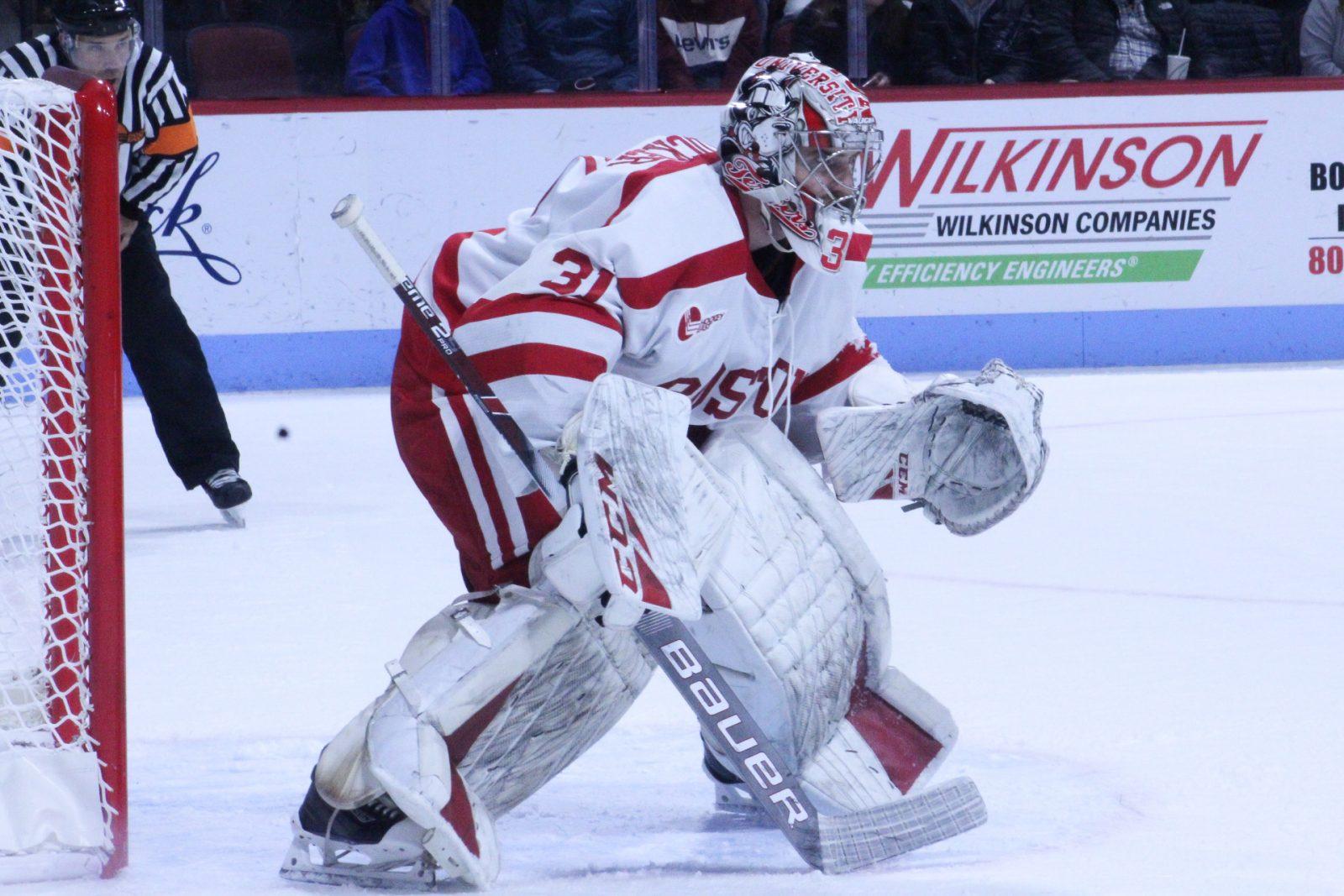 Sam Tucker faces a shooter against University of Massachusetts Amherst. JENNA VANSICKLE/ DAILY FREE PRESS STAFF