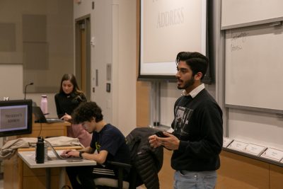 Student Body President Dhruv Kapadia speaking at the StuGov meeting.