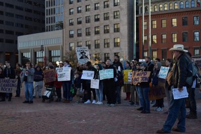 Protesters gather at the Indigenous Peoples Day rally Wednesday evening at Boston’s City Hall Plaza. PHOTO BY ASHLEY GRIFFIN/ DAILY FREE PRESS CONTRIBUTOR