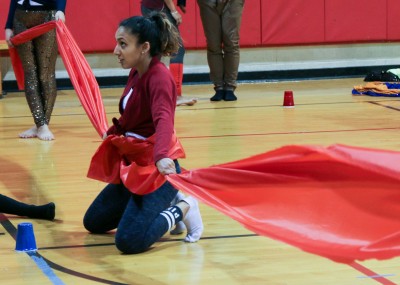 A member of BU Jalwa, a co-ed dance team that practices hip-hop, Bollywood, Bhangra, contemporary and charisma dance, practices for the national competition in Ohio this weekend in the Sargent Activities Center Gym Tuesday evening. PHOTO BY BRITTANY CHANG/DAILY FREE PRESS STAFF