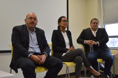 The 2015 Hugo Shong Reporting on Asia Award winner, Jason Rezaian, speaks beside his wife, Yeganeh Salehi, and brother, Ali Rezaian, Tuesday afternoon at the College of Communication. PHOTO BY ERIN BILLINGS/DAILY FREE PRESS STAFF