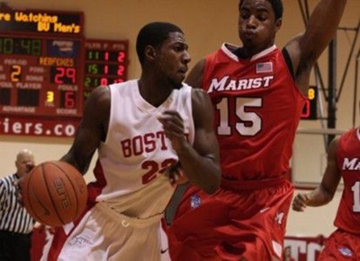 In 2011, John Holland led BU to an NCAA Tournament berth. Now, he's back in Boston with the playoff-bound Celtics DFP FILE PHOTO