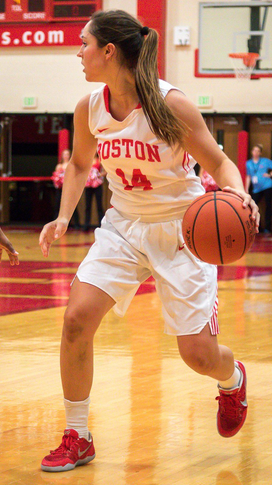Senior guard Courtney Latham had four assists against UNH. PHOTO BY JOHN KAVOURIS/ DAILY FREE PRESS STAFF 