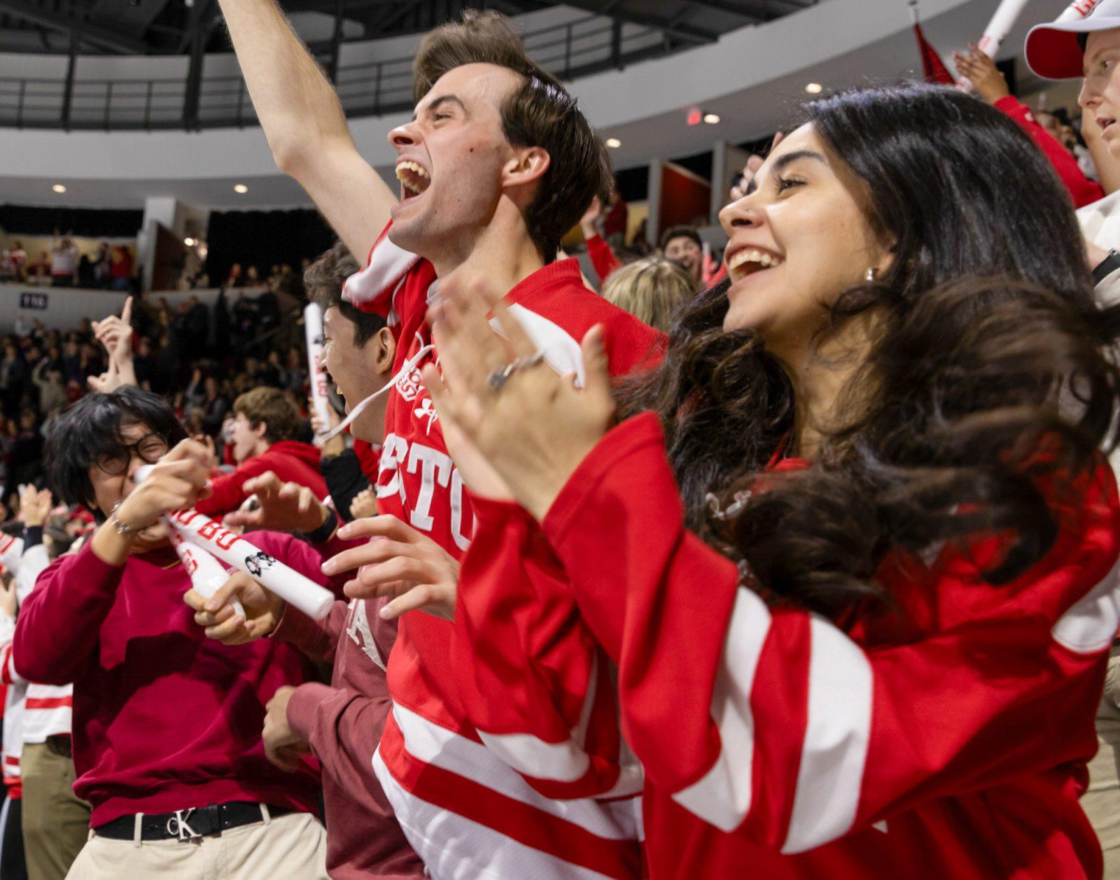 Senior Brayden Soffa (middle) and other students celebrate a Boston University goal in a game against Boston College on January 27. Unregistered BU student organizations, such as BU Dog Pound, do not benefit from BU’s Giving Day fundraising event. KATE KOTLYAR/DFP PHOTOGRAPHER
