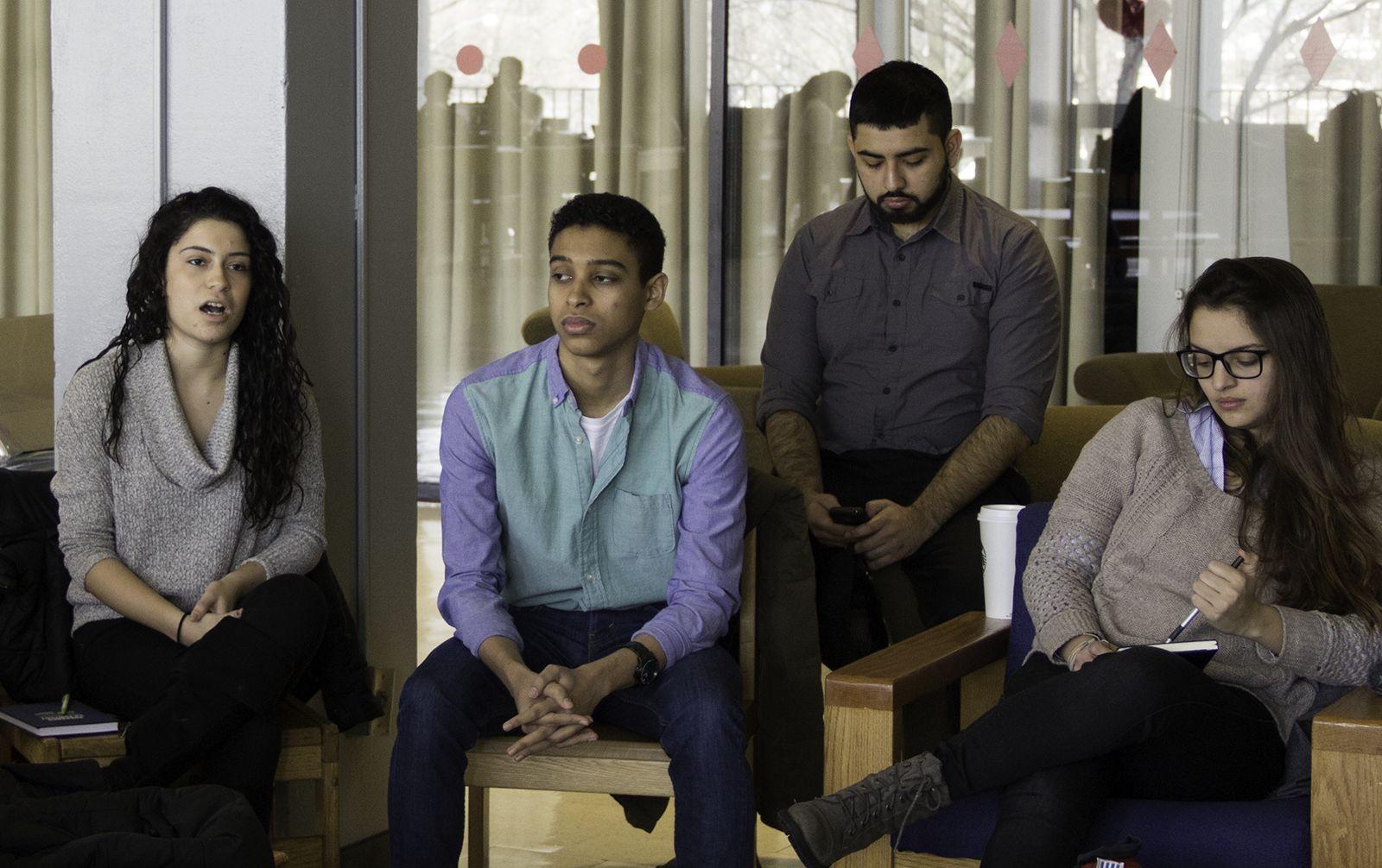 Angelica Silva (CAS '16), president of Alianza Latina, speaks at a town hall meeting for the Latin American Student Association. PHOTO BY MARY SCHLICHTE/ DAILY FREE PRESS STAFF