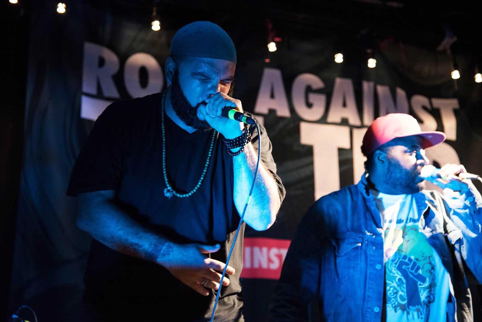 Ernesto "Eroc" Arroya-Montana and Jonathan Gramling perform at the Rock Against the TPP event in Jamaica Plain Friday. PHOTO BY LAUREN PETERSON/DAILY FREE PRESS STAFF