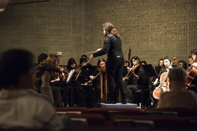 Conductor Anthony Sabatino leads the “Ace Plays Opera” performance Friday at First Church in Boston. PHOTO BY LEXI PLINE/ DAILY FREE PRESS
