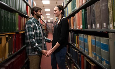 Madeline Goldstein and her boyfriend Aaron McGill pose in Mugar Memorial Library Sunday. PHOTO BY NICKI GITTER/DAILY FREE PRESS STAFF