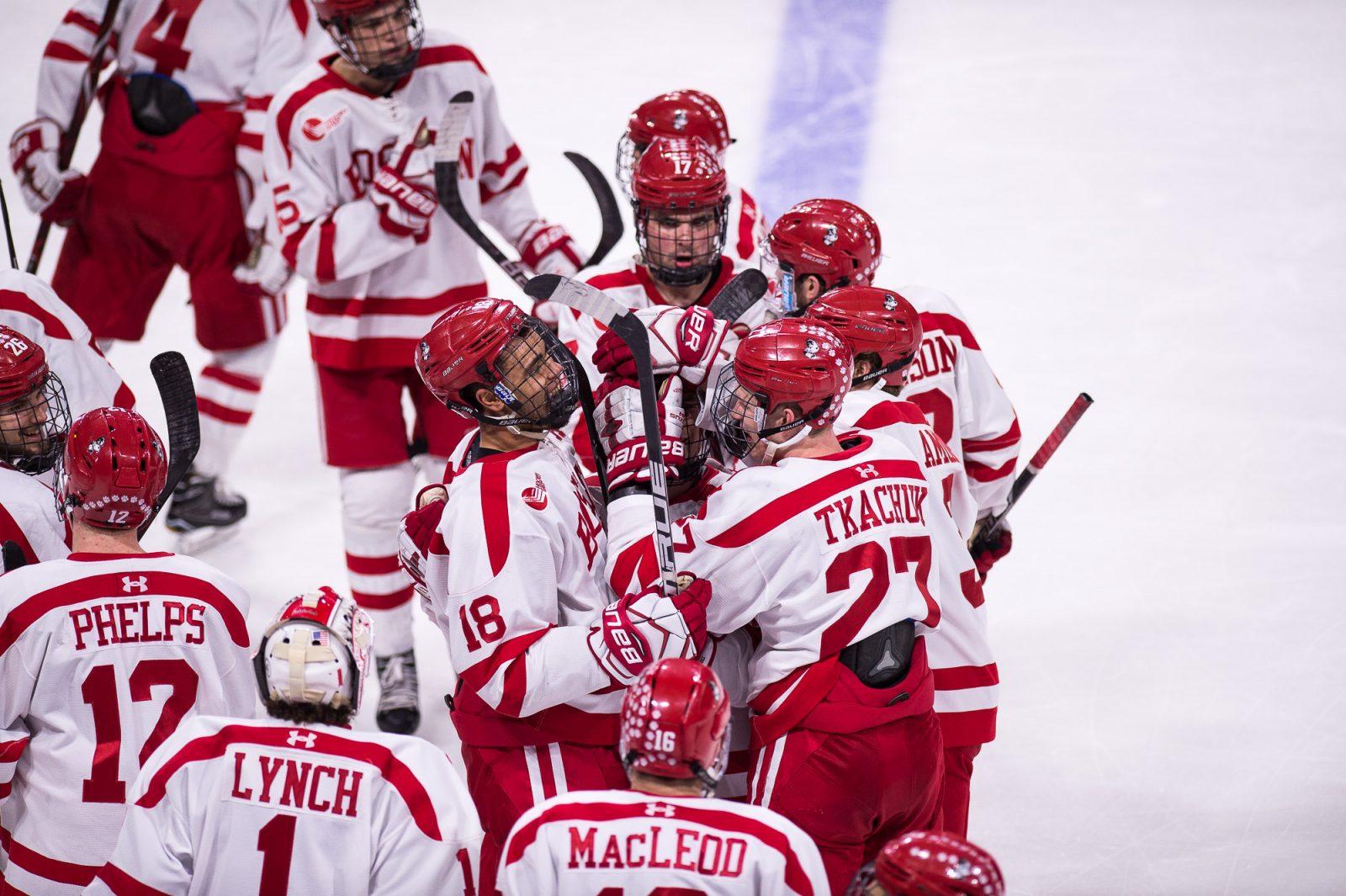 Boston Univeristy men's hockey team celebrating after beating UConn in game one of the Hockey East quarterfinals. 