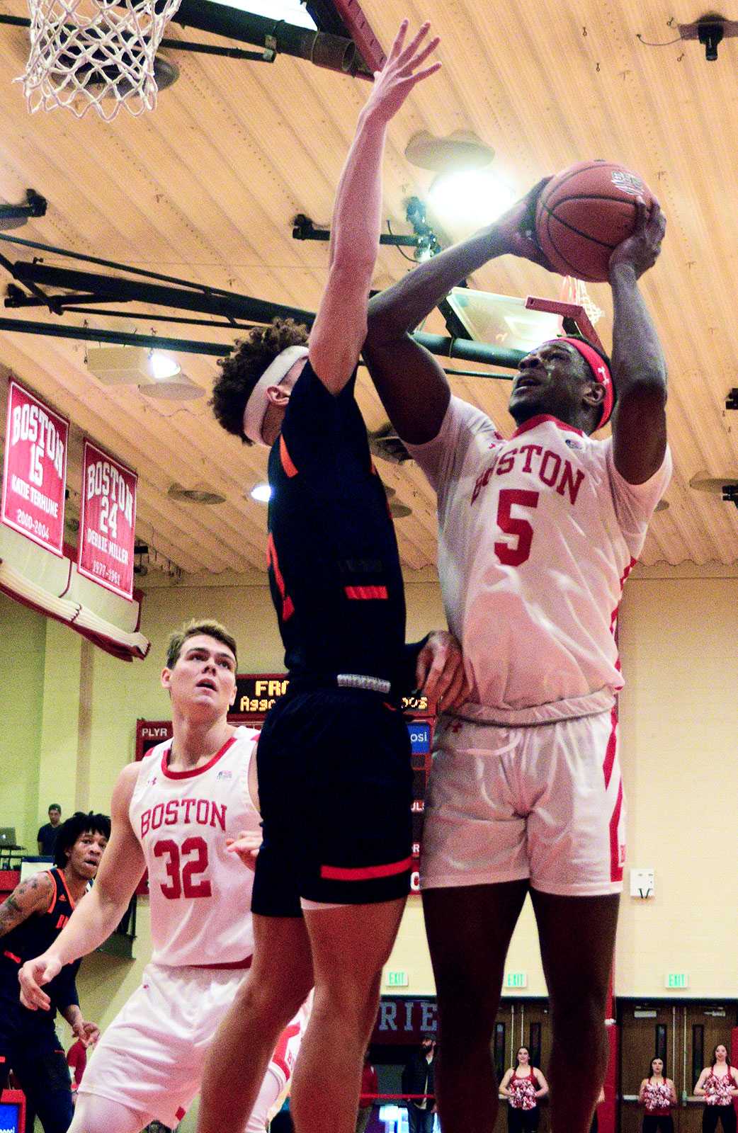 Sophomore guard Walter Whyte, far right, in a Saturday game against Bucknell University. Whyte recorded his seventh double-double of the 2019-20 season during BU’s semifinal win over Navy Thursday night. JACOB COLLING/ DAILY FREE PRESS STAFF