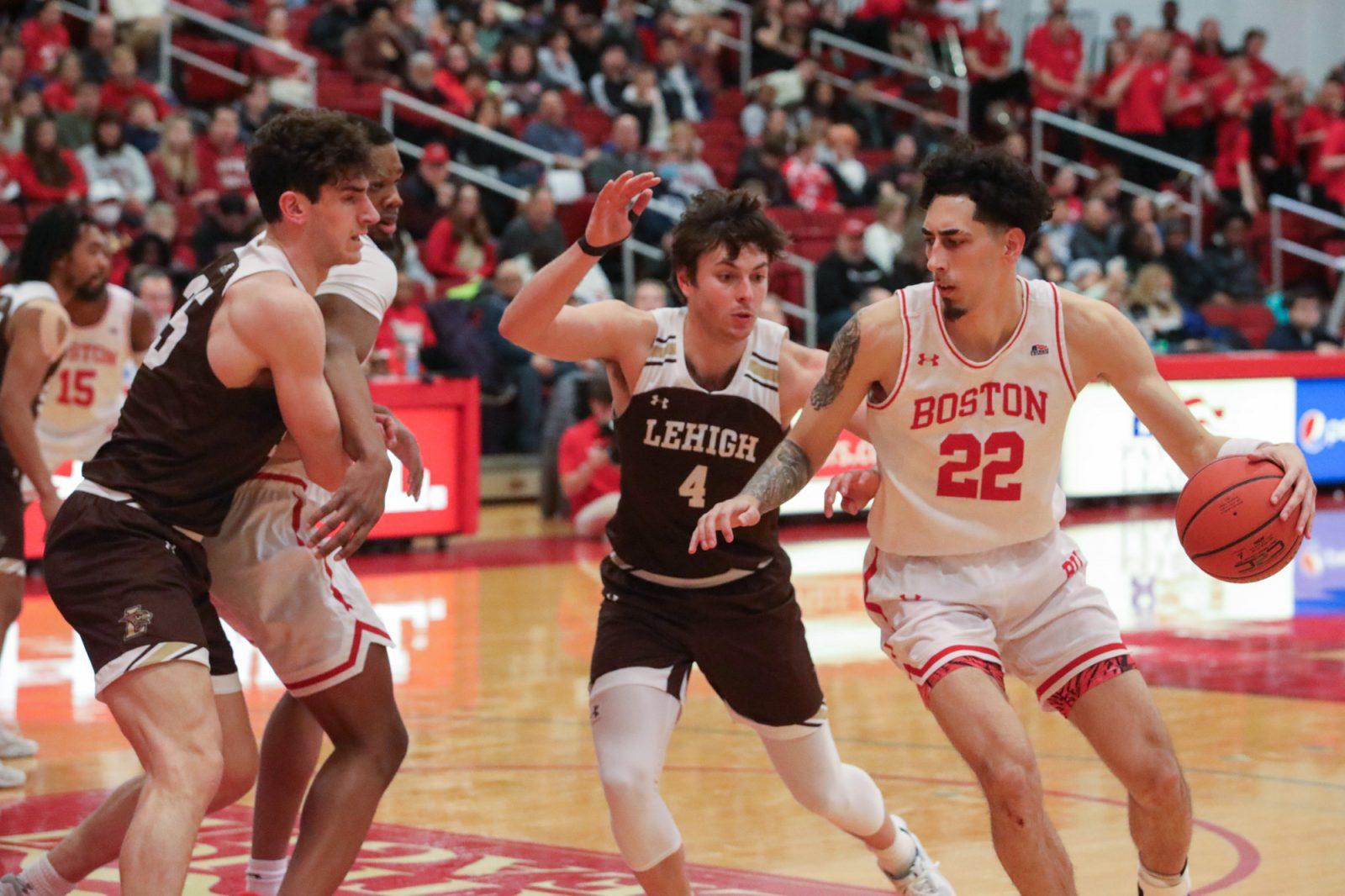Senior wing Anthony Morales (22) in a game against Lehigh University in February. The Terriers fell to University at Albany 86-72 on Wednesday. BRENDAN NORDSTROM/DFP PHOTOGRAPHER
