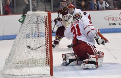 Senior goaltender Sean Maguire stops a shot against BC on Saturday. PHOTO BY MADDIE MALHOTRA/DAILY FREE PRESS STAFF