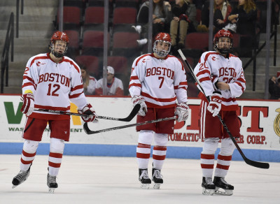 From left to right: Chase Phelps, Charlie McAvoy and Brien Diffley skate to the bench during BU's 4-2 loss to Vermont. PHOTO BY MADDIE MALHOTRA/DAILY FREE PRESS STAFF