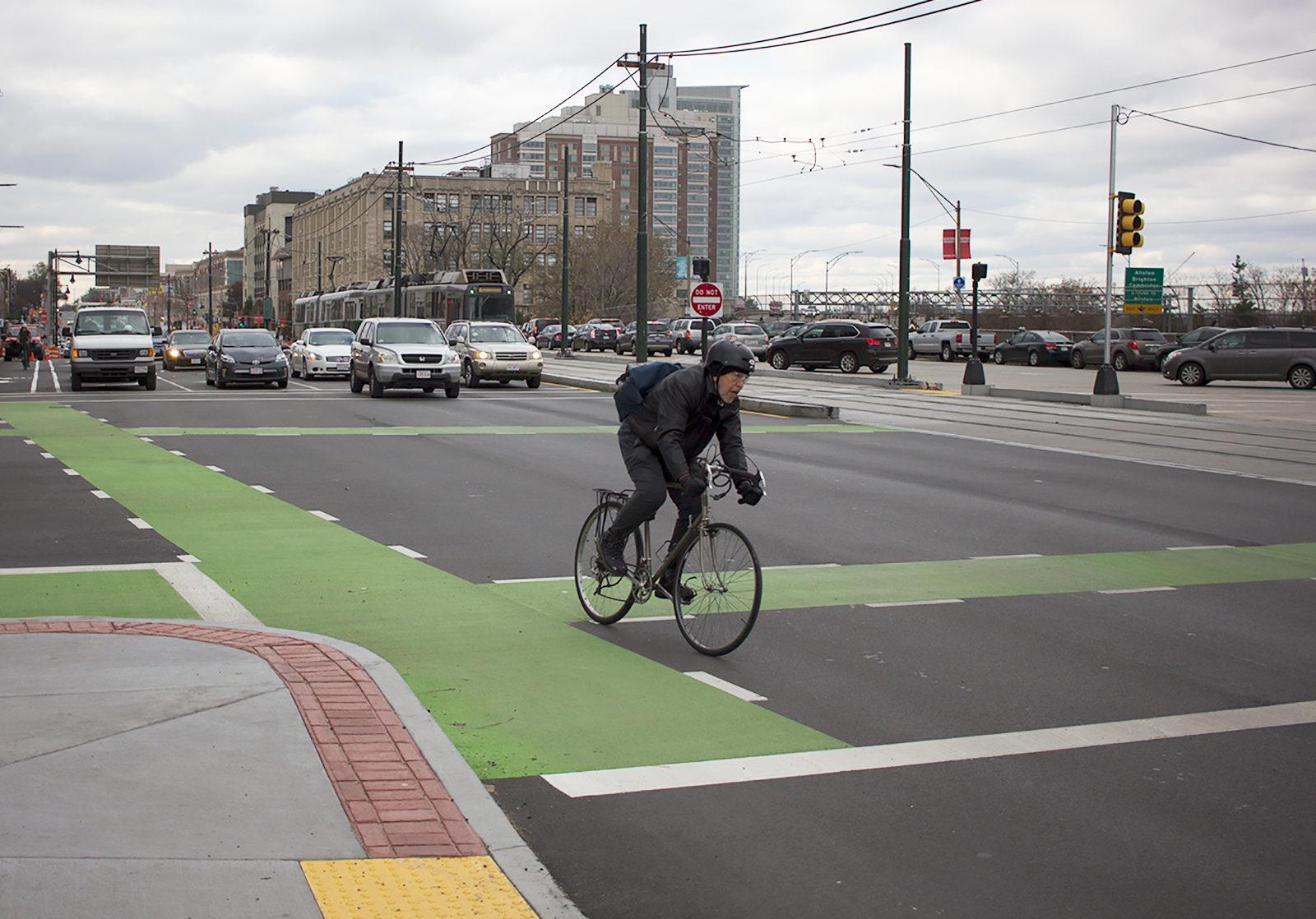 The Massachusetts Department of Transportation begins building Boston’s first protected bike lane along Commonwealth Avenue. PHOTO BY VIVIAN MYRON/ DAILY FREE PRESS STAFF