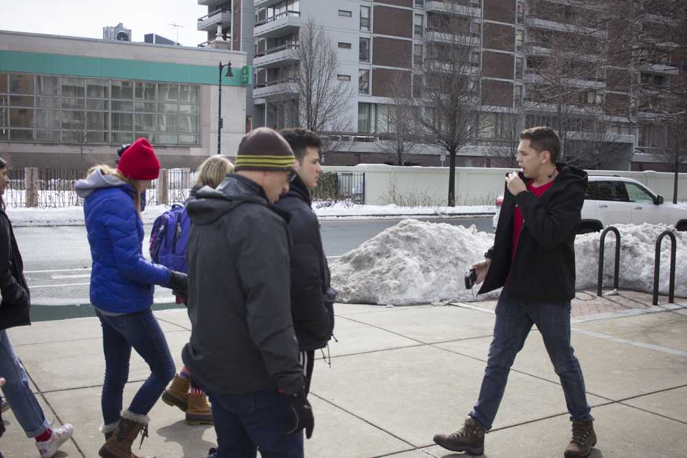 Nicolas Suarez leads a tour for prospective students on Wednesday afternoon. PHOTO BY VIVIAN MYRON/ DAILY FREE PRESS STAFF
