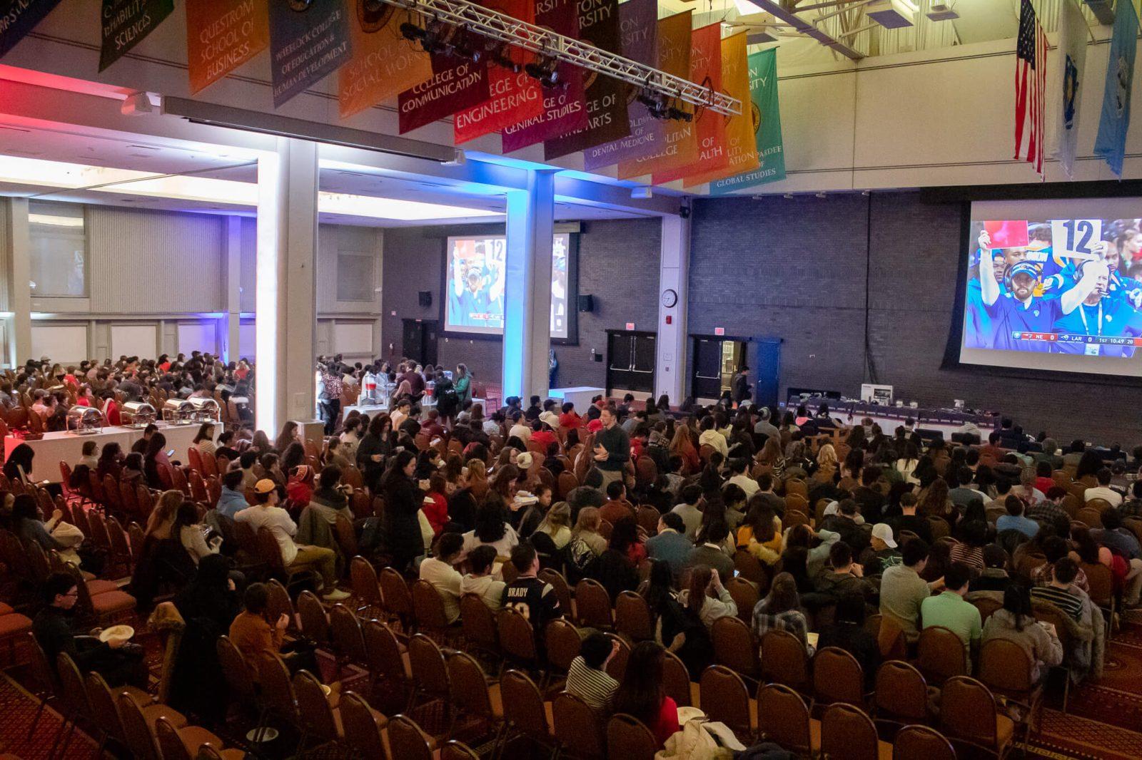 Boston University students gather in the Metcalf Ballroom Sunday to watch Super Bowl LIII. RACHEL SHARPLES/ DAILY FREE PRESS STAFF