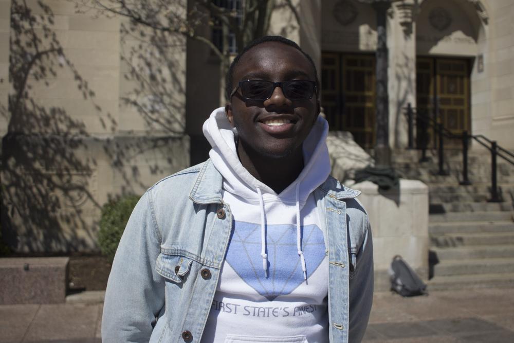 Anthony Dongfack, above, and fellow BU students donated more than a dozen Rhetty-to-Go meals to individuals affected by homeless. PHOTO BY VIVIAN MYRON/DAILY FREE PRESS STAFF 