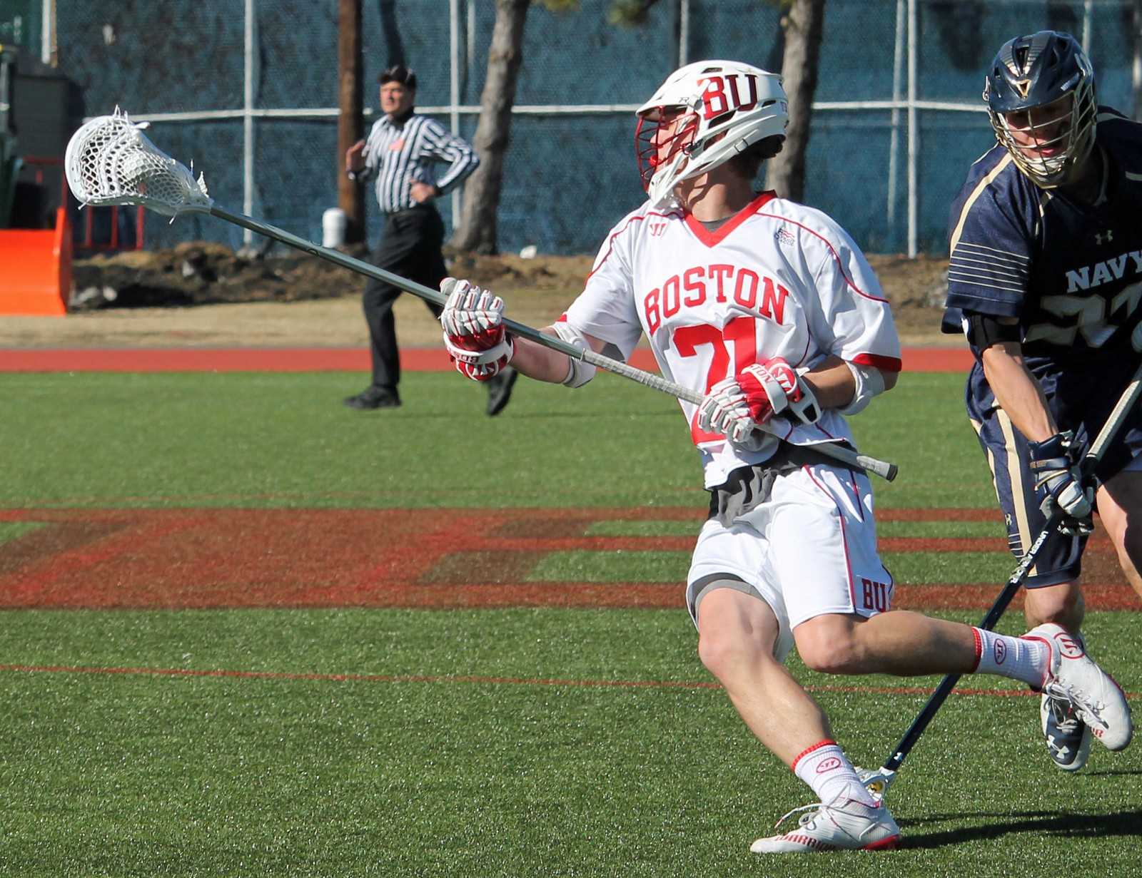 Wozniak spent his freshman and sophomore seasons shining as a long stick midfielder, but starred in his move back to defense.