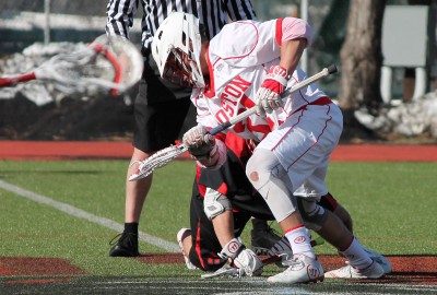Sam Talkow was instrumental against the Crimson, winning 11 of his 19 faceoffs. PHOTO BY ABIGAIL FREEMAN/DAILY FREE PRESS STAFF