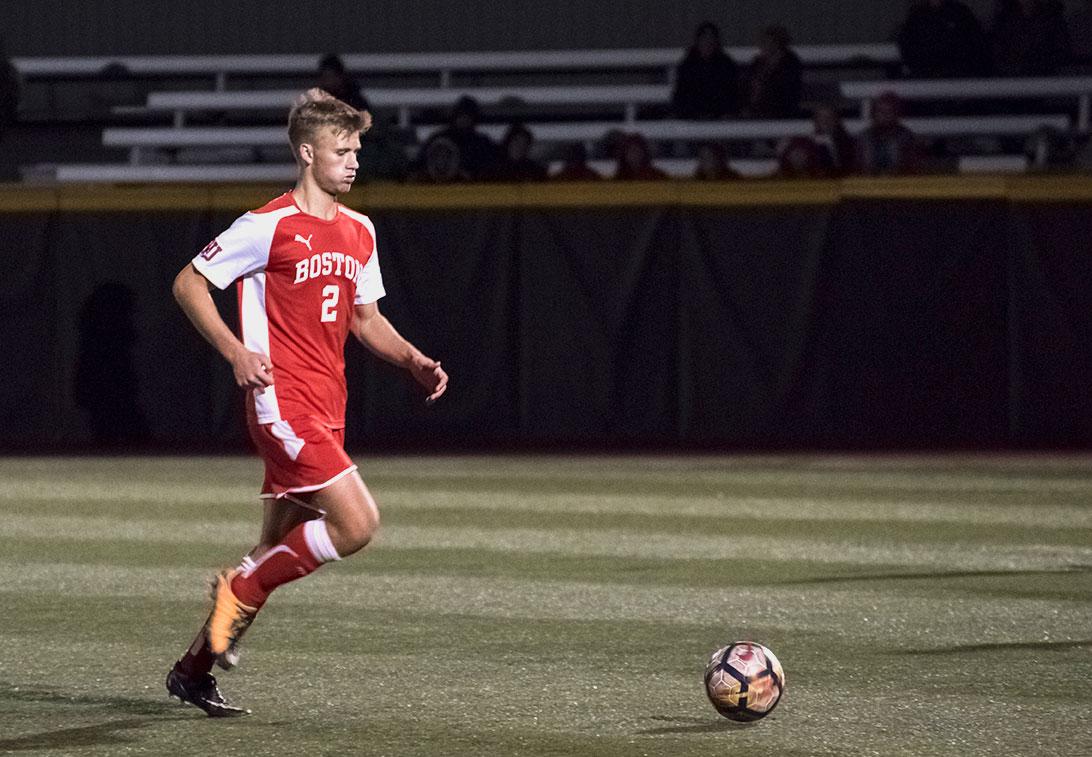 Sophomore defender Max Aunger in a match against Northeastern University in October 2017. Aunger put up his first assist of the season in a 1-0 win over the College of the Holy Cross Wednesday evening. LEXI PLINE/ DFP FILE PHOTO
