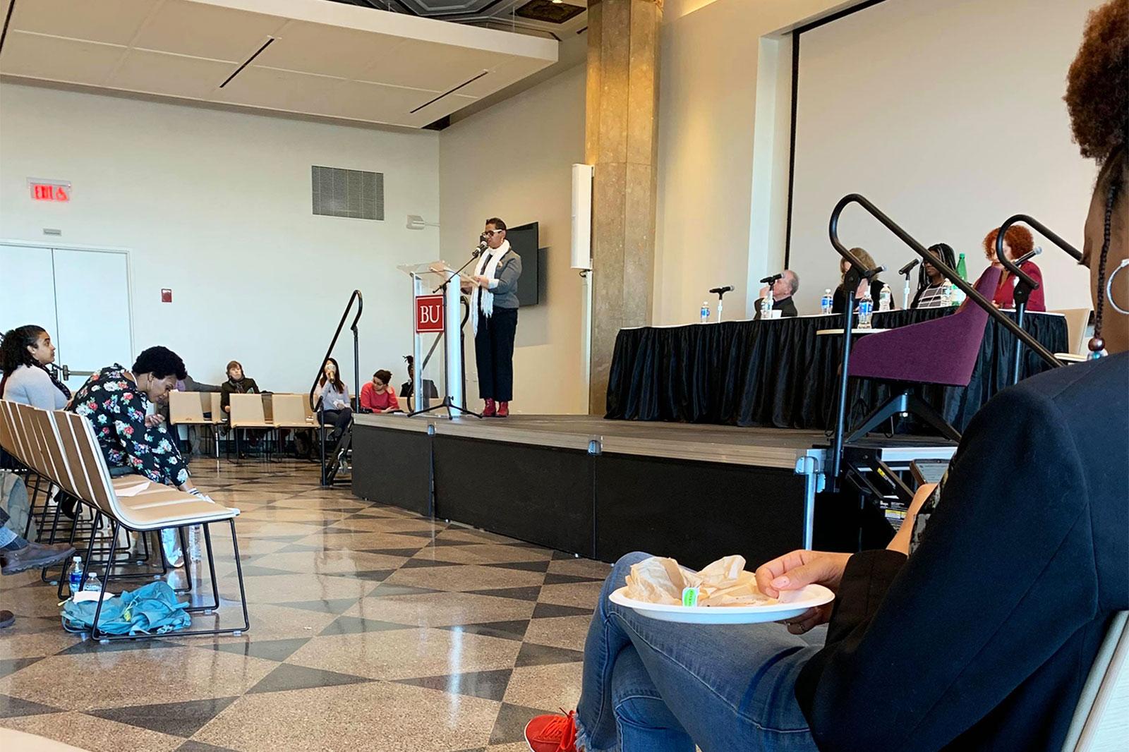 Paula Austin, an assistant professor of History and African American Studies in Boston University’s College of Arts and Sciences, speaks at the “Restorative Justice and Societal Repair” symposium at the Howard Thurman Center Friday. MADELINE HUMPHREY/ DAILY FREE PRESS STAFF