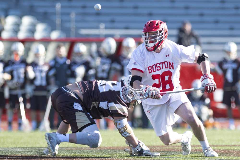 Freshman midfielder and faceoff specialist Kevin Snyder has taken 27 faceoffs for BU this season. PHOTO BY MADDIE MALHOTRA/DAILY FREE PRESS STAFF 