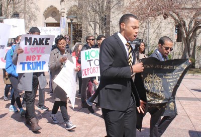 Members of the Sigma Chapter of Alpha Phi Alpha fraternity gather in Marsh Plaza Saturday morning before they marched to the Massachusetts State House in protest of the Donald Trump presidential campaign. PHOTO BY MADI GOLDMAN/DAILY FREE PRESS STAFF