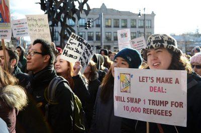 Protesters rally Monday afternoon in defiance of Donald Trump's new administration and his recent executive orders. PHOTO BY ABIGAIL FREEMAN/ DAILY FREE PRESS STAFF