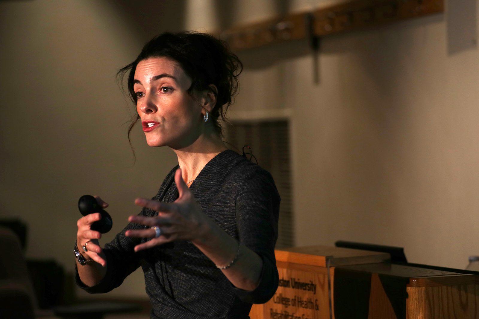 Alyson McGregor, the director of the Division of Sex and Gender in Emergency Medicine at Brown University, speaks at the Sargent College of Health and Rehabilitation Sciences Wednesday night about how sex and gender affect pharmaceutical testing. PHOTO BY AMANDA LUCIDI/ DAILY FREE PRESS STAFF