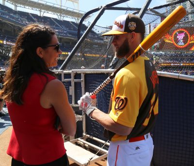 Broadcaster Jessica Mendoza chats with Nationals outfielder Bryce Harper. PHOTO COURTESY WIKIMEDIA COMMONS 