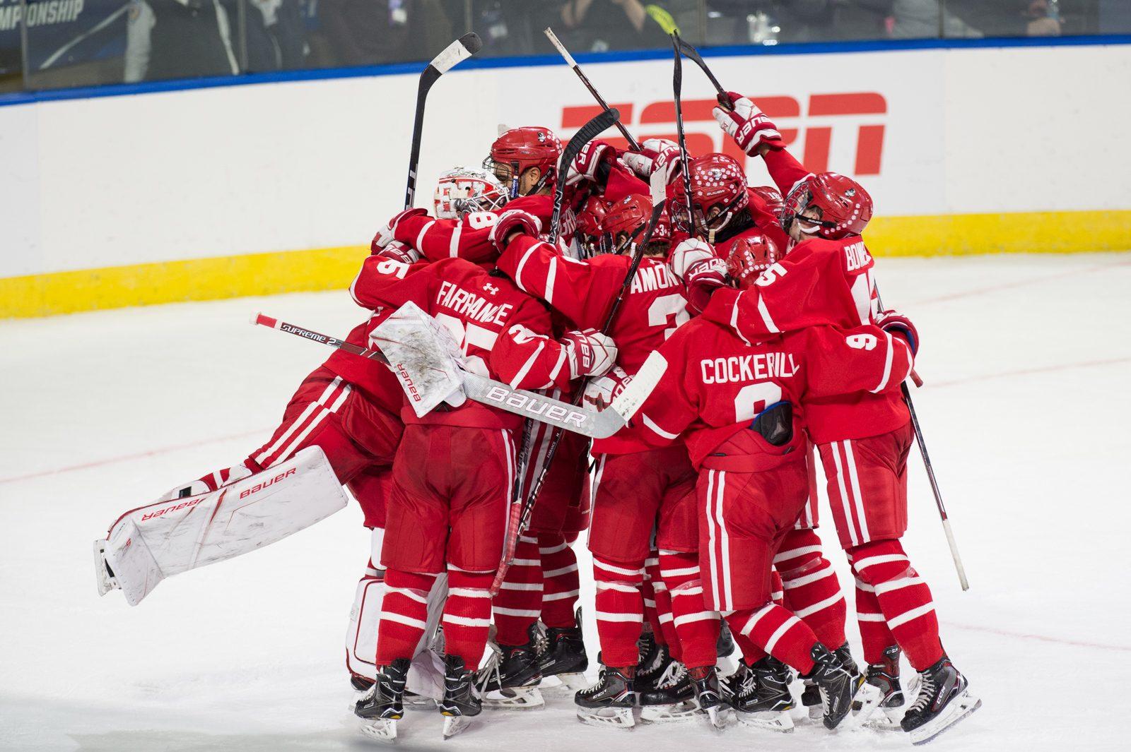 The Terriers celebrate after beating Cornell in the NCAA Northeast Regional.  PHOTO BY MADDIE MALHOTRA/ DAILY FREE PRESS STAFF 
