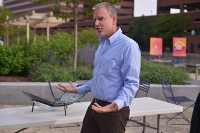 Sculptor Chris Williams shows the audience a piece of prototype of his Nerve Center sculpture during his HUBweek event. PHOTO BY SHANE FU/ DAILY FREE PRESS CONTRIBUTOR 