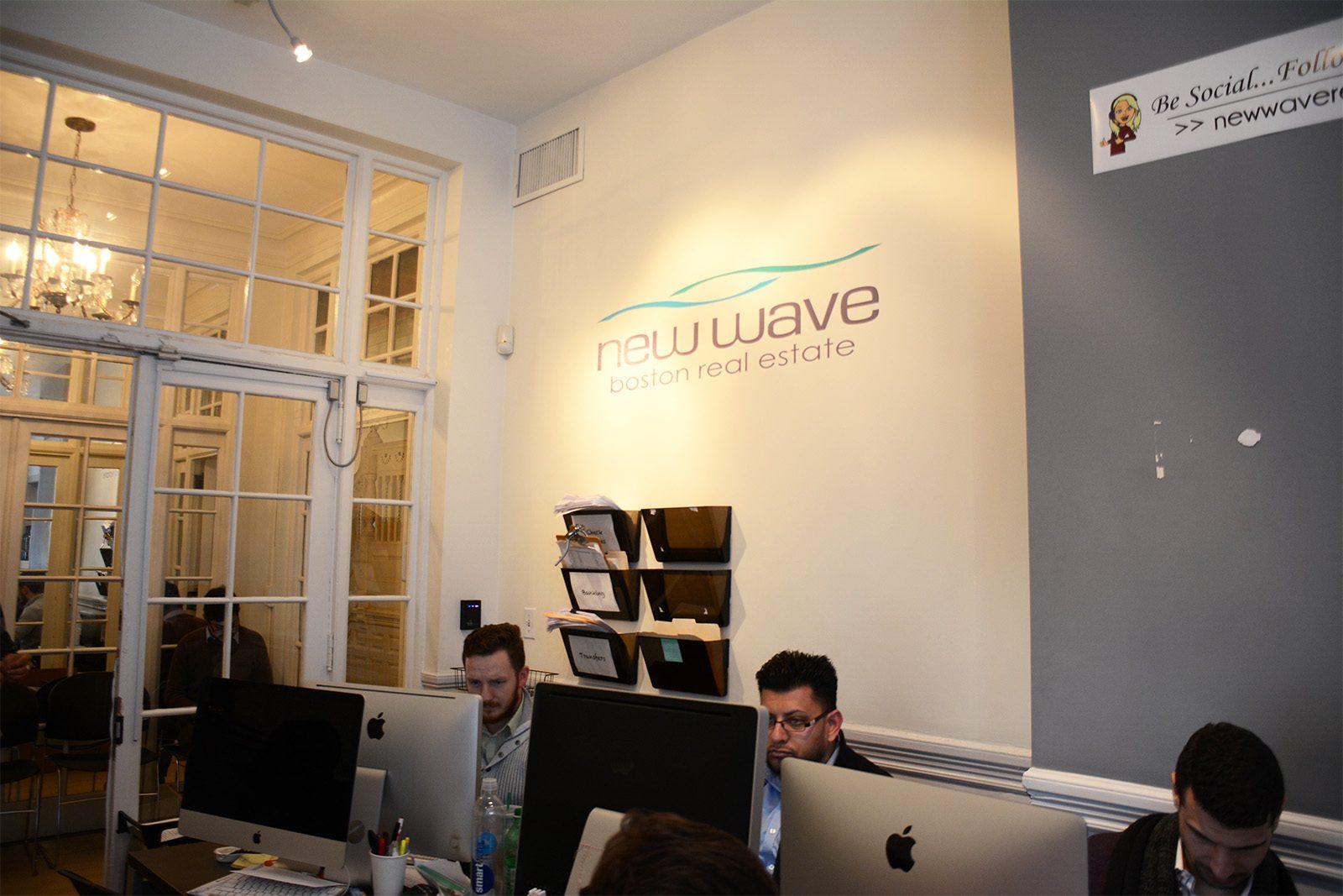 New Wave Boston Real Estate is one of the many businesses participating in One Boston Day, a citywide initiative that encourages random acts of kindness to commemorate the anniversary of the 2013 Boston Marathon bombing. PHOTO BY JINGYI LIN/ DAILY FREE PRESS STAFF