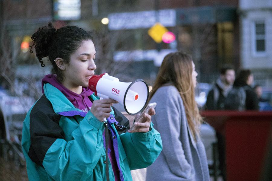 Sofia Colombo-Abdullah speaks at a rally against gun violence on Monday afternoon. PHOTO BY JOHN LITTLE/ DAILY FREE PRESS STAFF