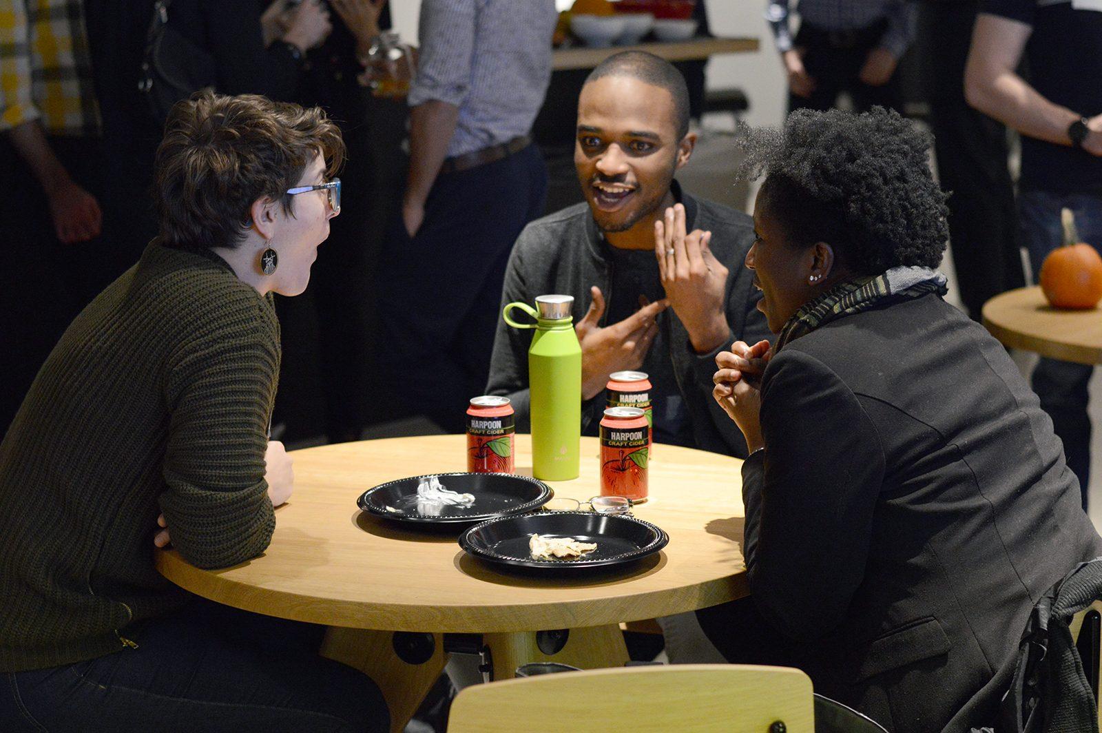 Members of the tech and LGBT communities network during Out in Tech’s kick-off social mixer Thursday at General Assembly in Boston. PHOTO BY VIGUNTHAAN THARMARAJAH