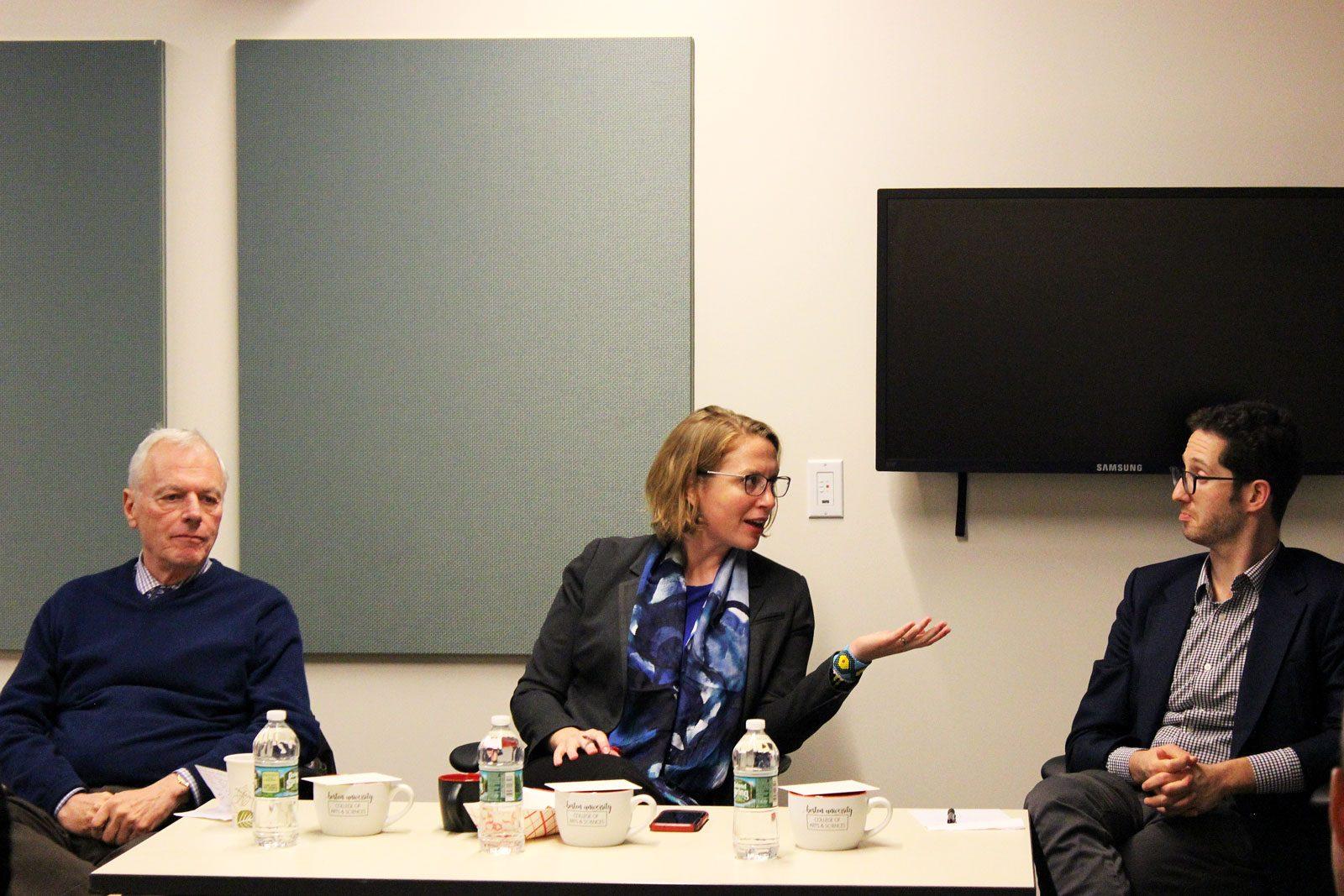 Boston University professor Joe Wippl and assistant professors Julie Klinger and Joshua Shifrinson speak at a panel on U.S. foreign policy concerning Latin America Wednesday evening. EMILY CANDAL/ DAILY FREE PRESS STAFF